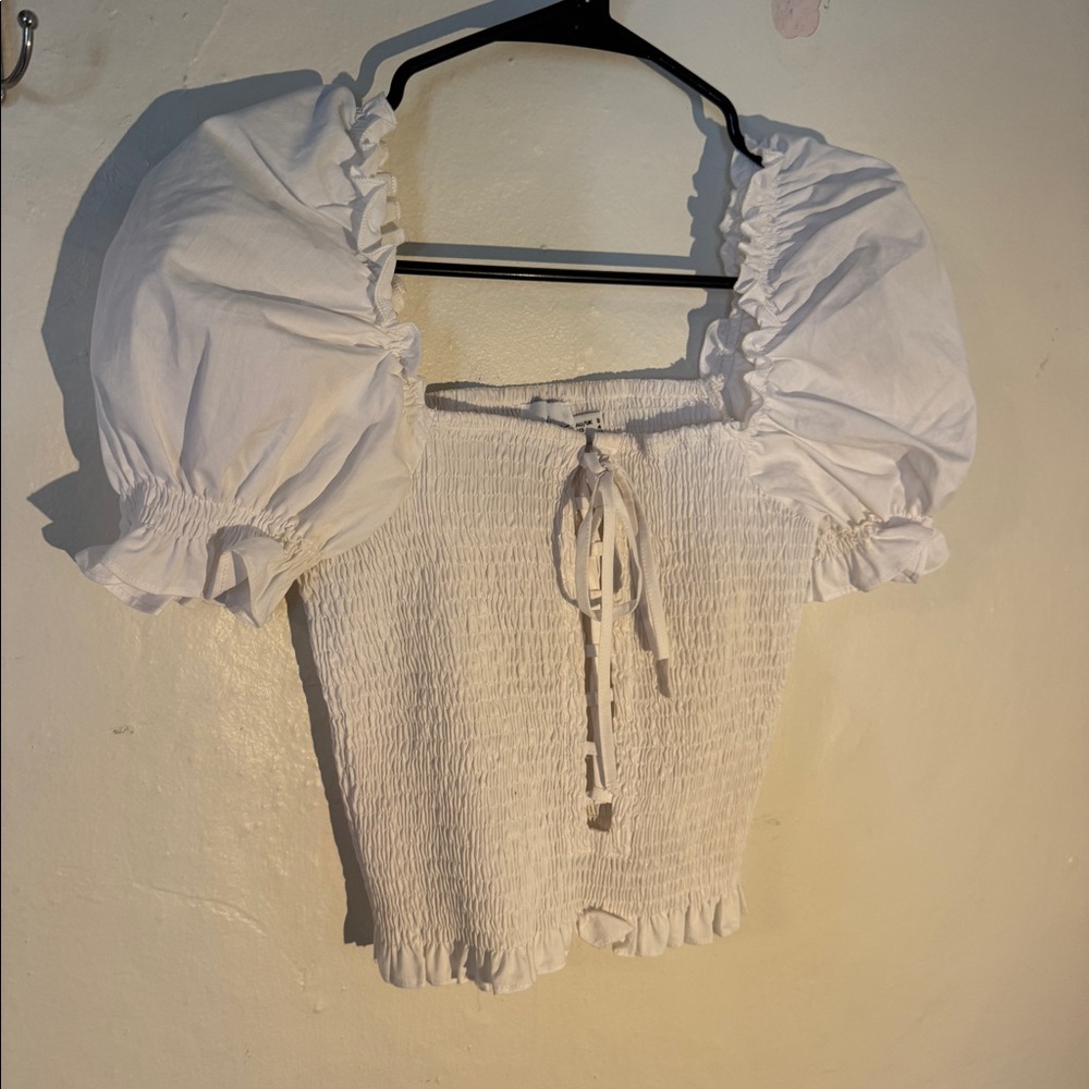 White puff sleeve going out top